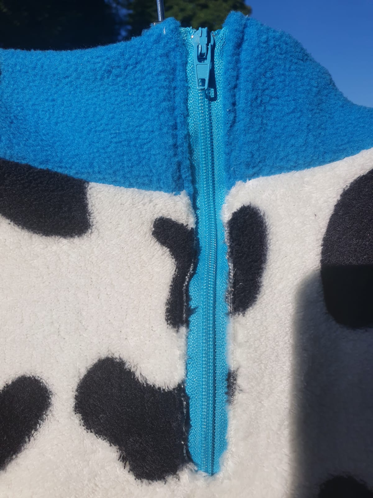 Teal and cow print fleece (M)