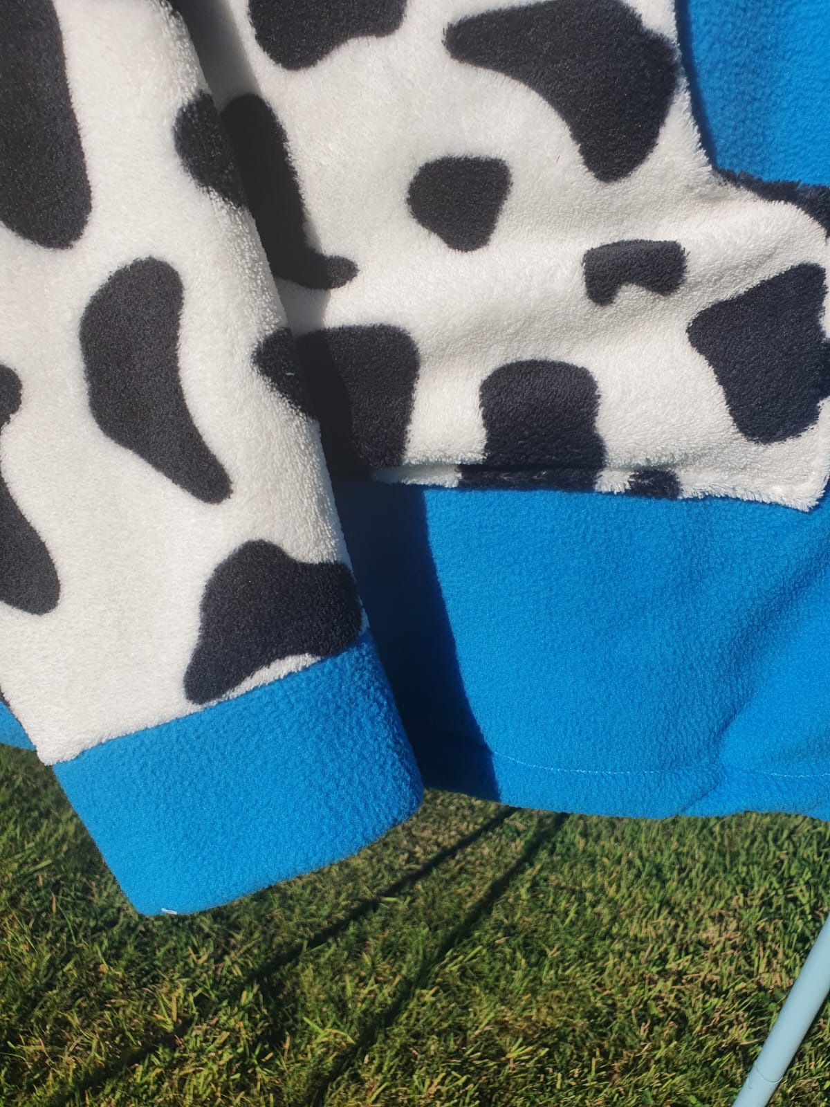 Teal and cow print fleece (M)