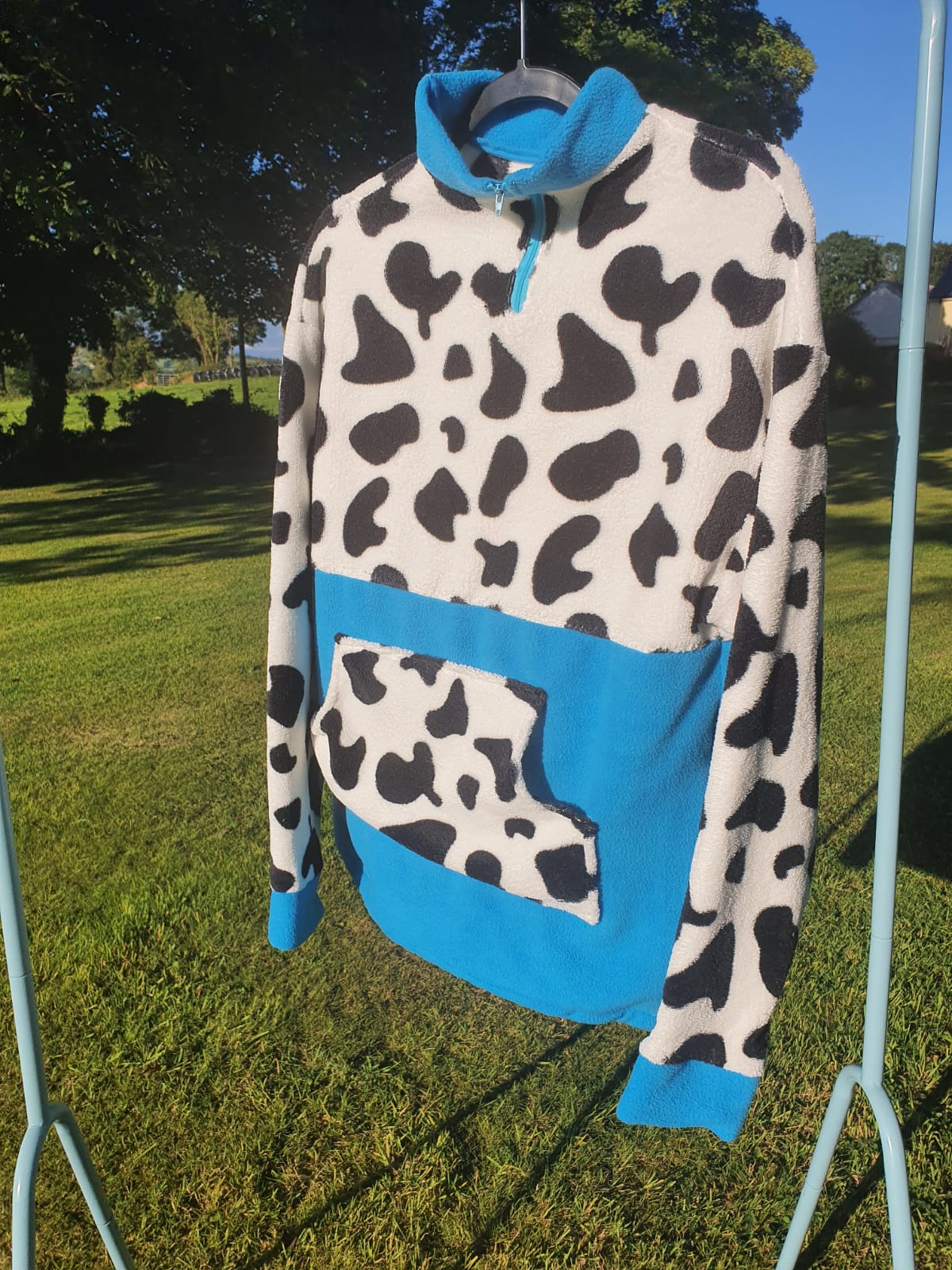 Teal and cow print fleece (M)